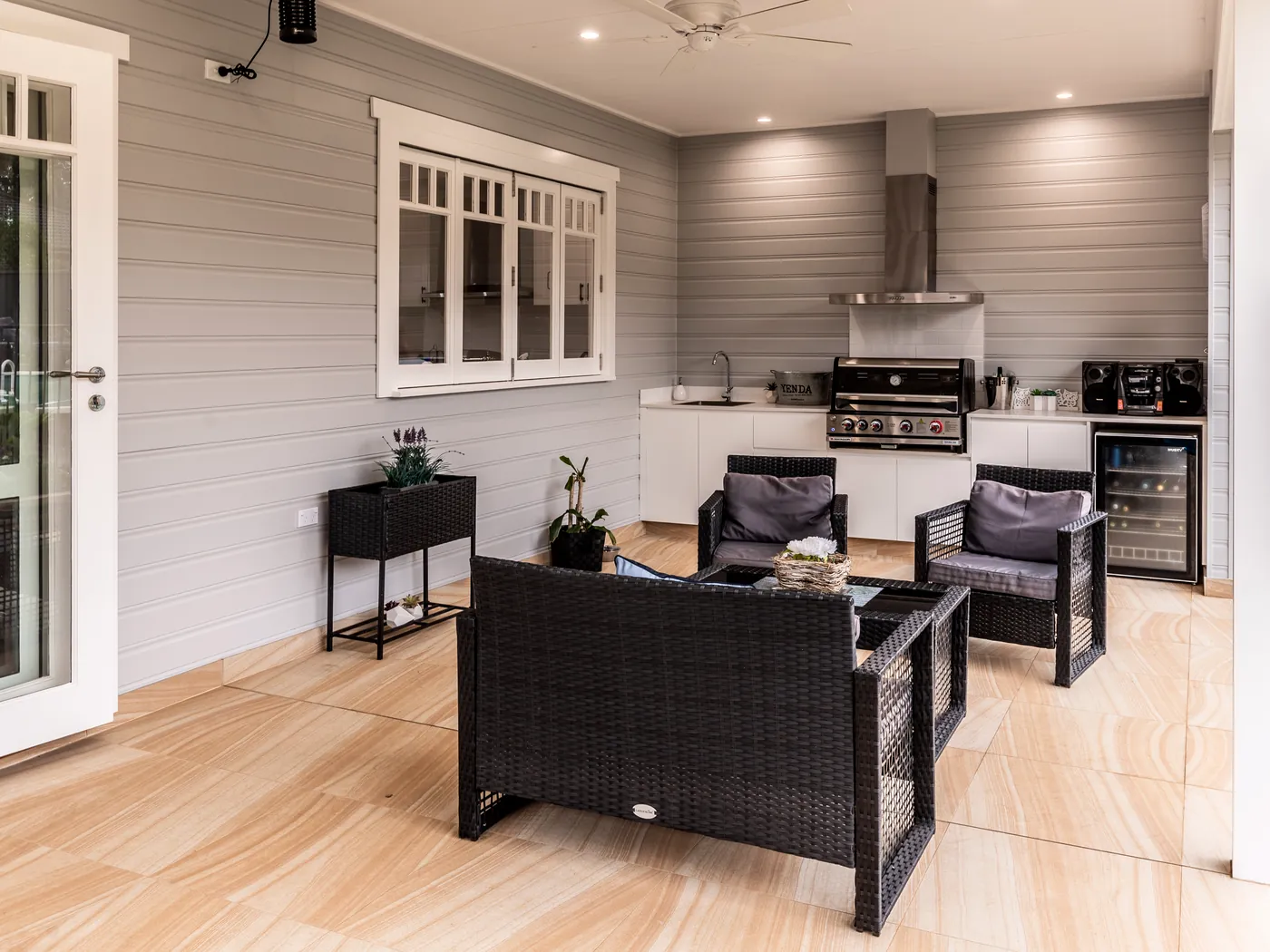Covered alfresco with outdoor kitchen