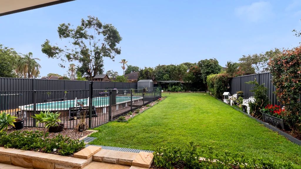 Rear yard, turf and pool outlook