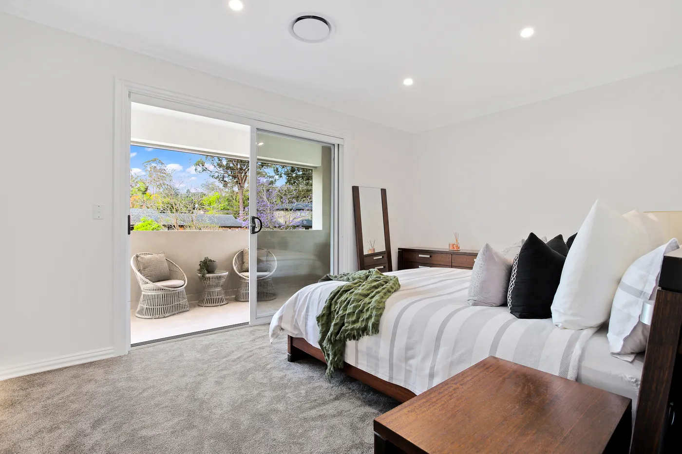 Main bedroom with balcony access