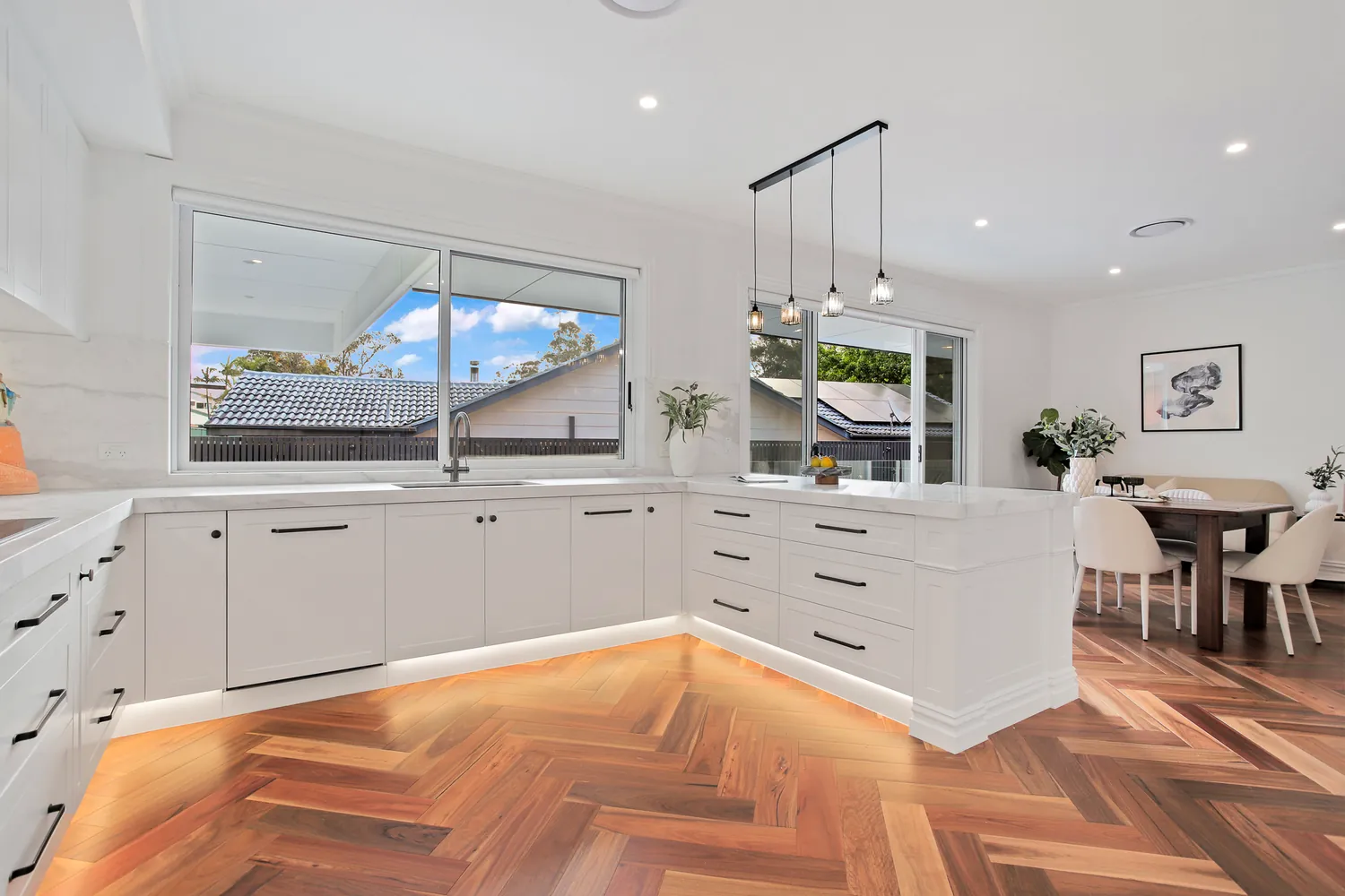 Kitchen with stone island and walk-in pantry