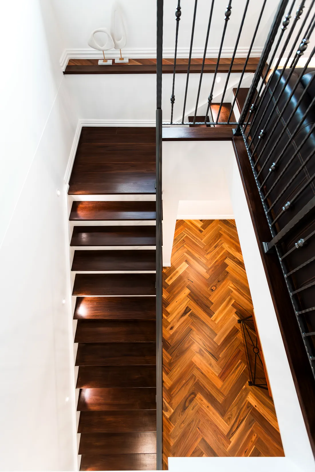 Stair detail, parquet and steel balustrade