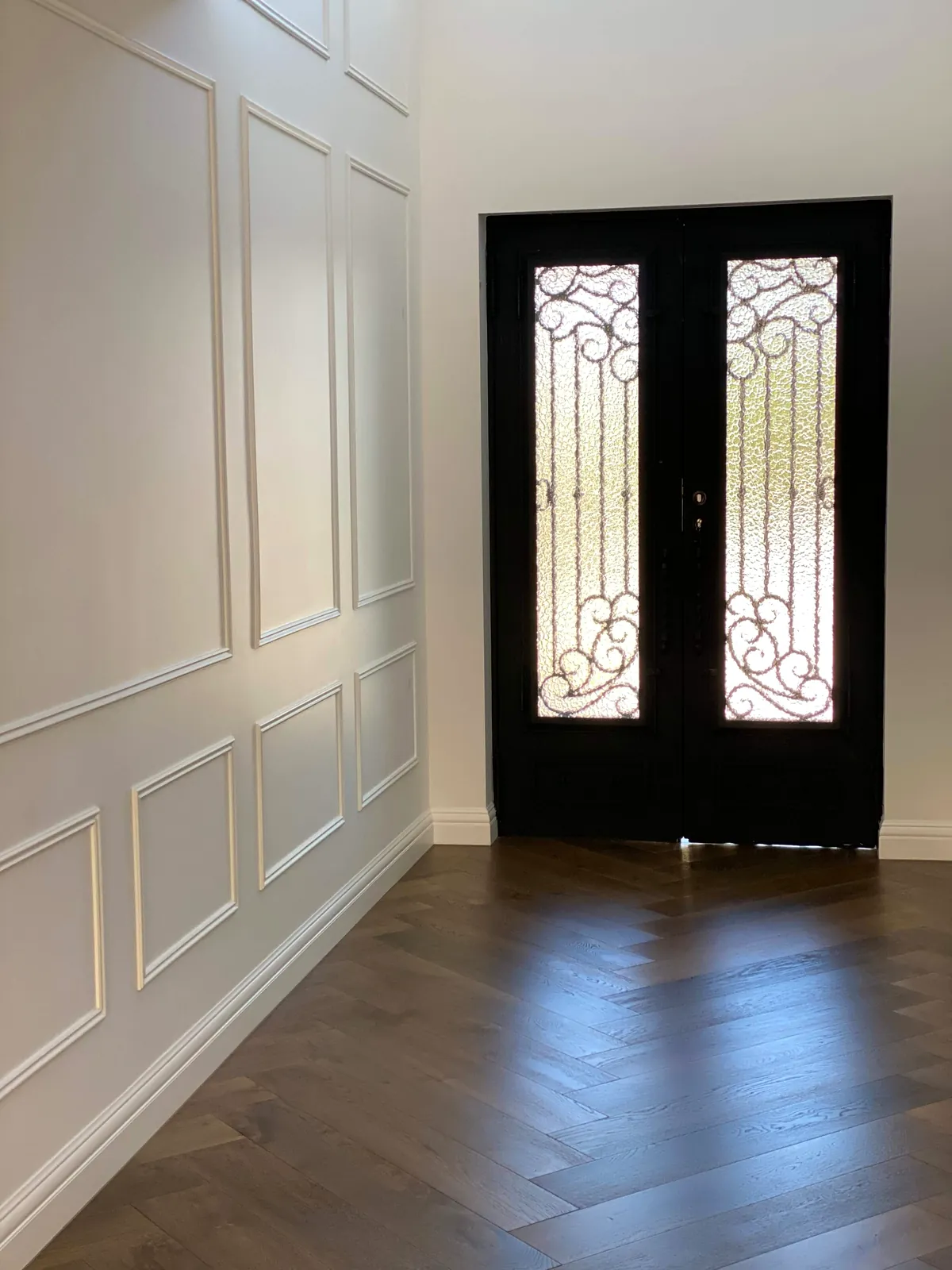 Panelled entry with feature door